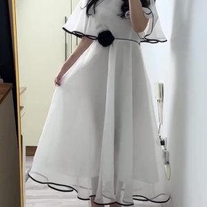 White Chiffon Maxi Dress With Black Trim And Floral Accent