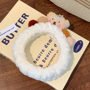 Cartoon Cute Sweet Girl Applying Makeup With A Face Mask And Hair Band